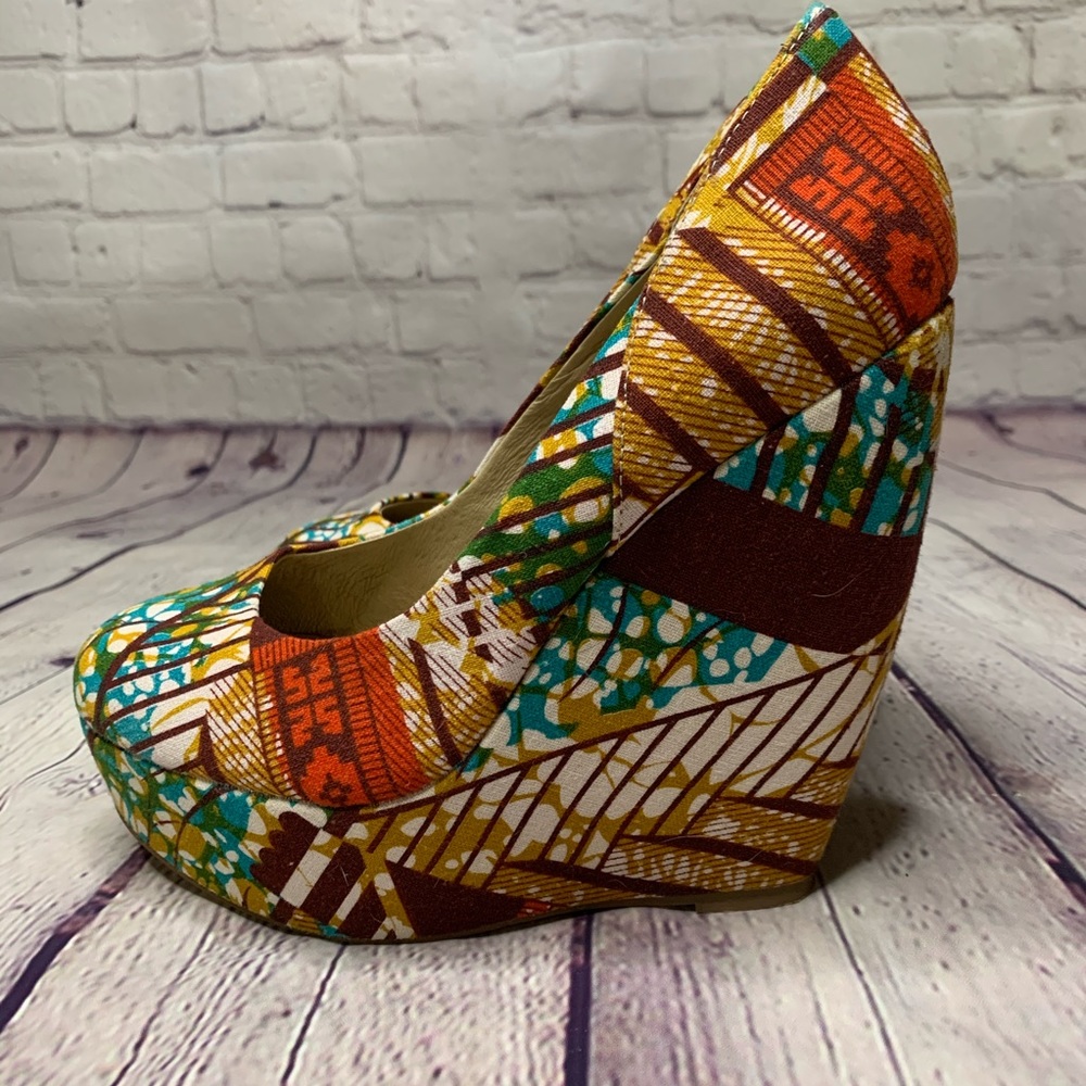 **Sold** Aldo Wedge size 8